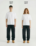 "EVERYTHING I LOVE IS ILLEGAL EXPENSIVE OR BRUNETTE" Oversized T-Shirt